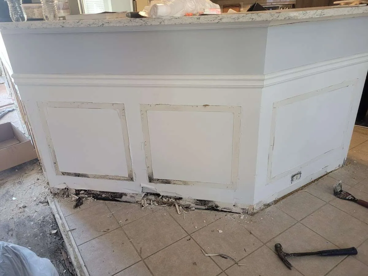 Water damage and mold on kitchen during Storm Damage Restoration in Grove